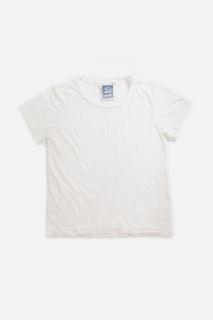 The Jungmaven Ojai Tee in Washed White, a unisex organic cotton t-shirt, is laid flat on a white background with a visible blue and white Jungmaven label inside the collar.