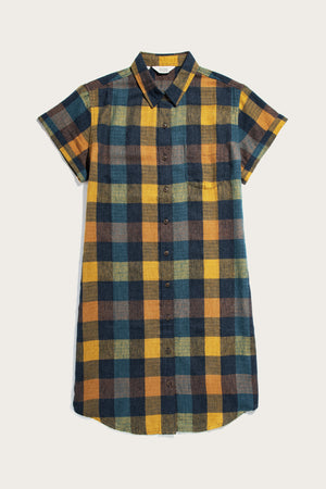 The Loren Shirt Dress / Moonbow Plaid by Bridge & Burn features short sleeves, button front, and recycled cotton in yellow, blue, and brown plaid—part of our sustainable series, shown flat on a light background.