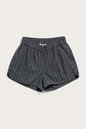 The Bridge & Burn Luca Track Short in Charcoal Stripe features thin white pinstripes, an elastic waistband, and side pockets. Crafted from a cotton-linen blend, these summer shorts are shown laid flat against a plain light background.