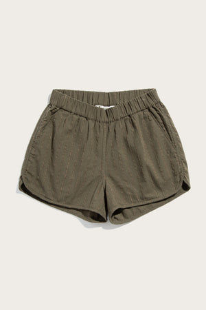 The Bridge & Burn Luca Track Short in Olive Stripe features subtle vertical pinstripes, an elastic waistband, and side pockets, shown laid flat on a light background.