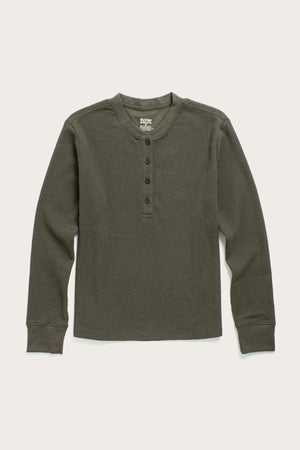 The Bridge & Burn Women's Recycled Waffle Henley in Forest Melange is a long-sleeve, dark green shirt with a round neck and four-button placket, made from recycled fibers and featuring a cozy thermal waffle-knit texture.