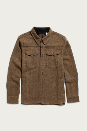 The Bridge & Burn Fielding Shirt Jacket in Tawny Tweed is a heavyweight wool flannel shirt with a collar, long sleeves, and two flap chest pockets, shown on a plain white background.
