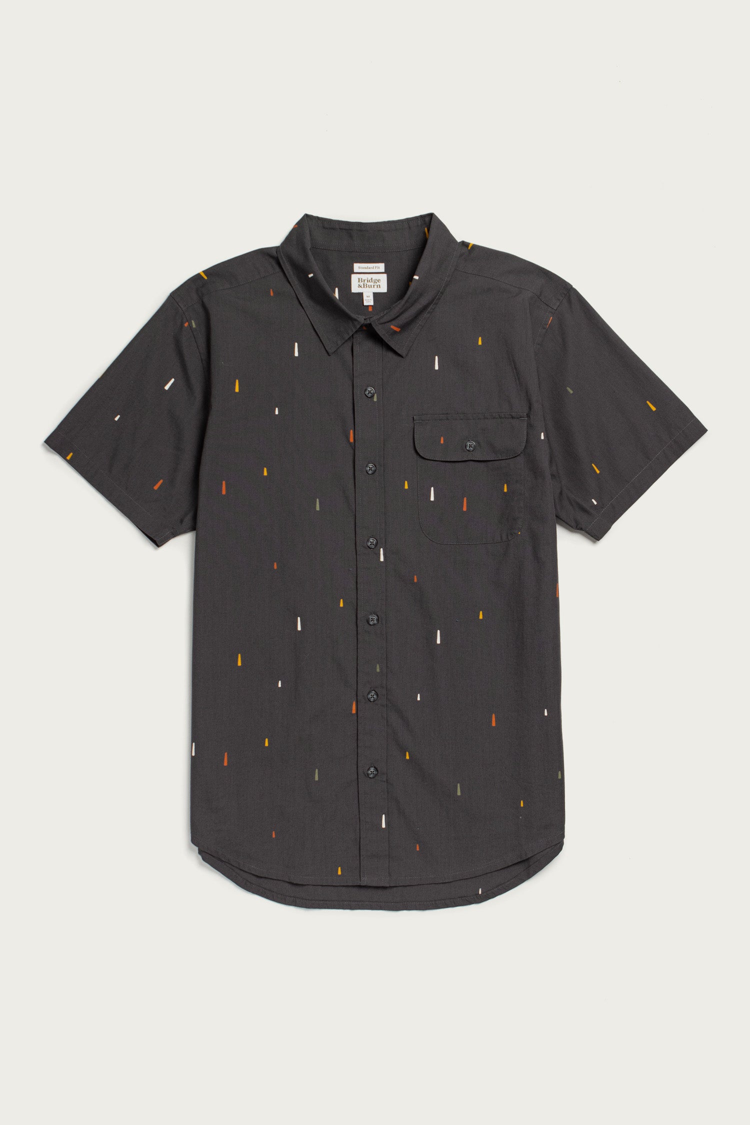 The Marten Shirt / Midnight Rain by Bridge & Burn is a classic fit, short sleeve black cotton button-down with a front pocket and colorful vertical dash pattern—perfect for adding style to any wardrobe.
