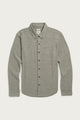 The Bridge & Burn Sutton Slim Shirt in olive twill features a minimalist design with a collar and chest pocket, crafted from recycled cotton, and is shown laid flat on a white background.