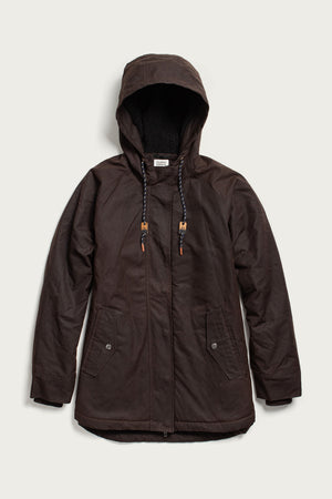 The Bridge & Burn Sequoia Parka in umber waxed canvas features a dark brown color, hood with toggle drawstrings, front zipper, snap-button pockets, and long sleeves, shown laid flat on a light background.