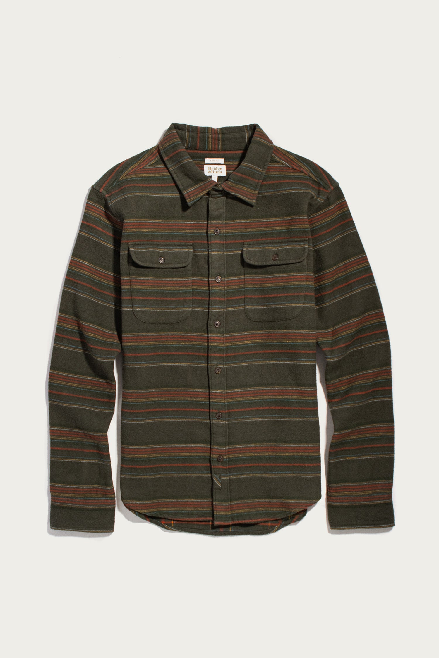 Bridge & Burn Cole Slim Shirt / Mallard Stripe, an olive green slim fit button-down shirt in brushed cotton with horizontal rust, tan, and dark blue stripes, featuring two chest pockets and a collar.