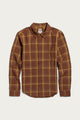 The Larson Shirt in Harvest Plaid by Bridge & Burn is a long-sleeve, classic fit button-up crafted from organic cotton, featuring a brown and yellow brushed flannel plaid pattern with a chest pocket. The shirt is shown laid flat against a white background.