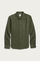 Bridge & Burn’s Sutton Slim Shirt in Pine Flannel features an olive green button-up design with long sleeves, a chest pocket, button-down collar, and brown buttons. Laid flat on a white background, this minimalist organic cotton shirt offers timeless style and comfort.