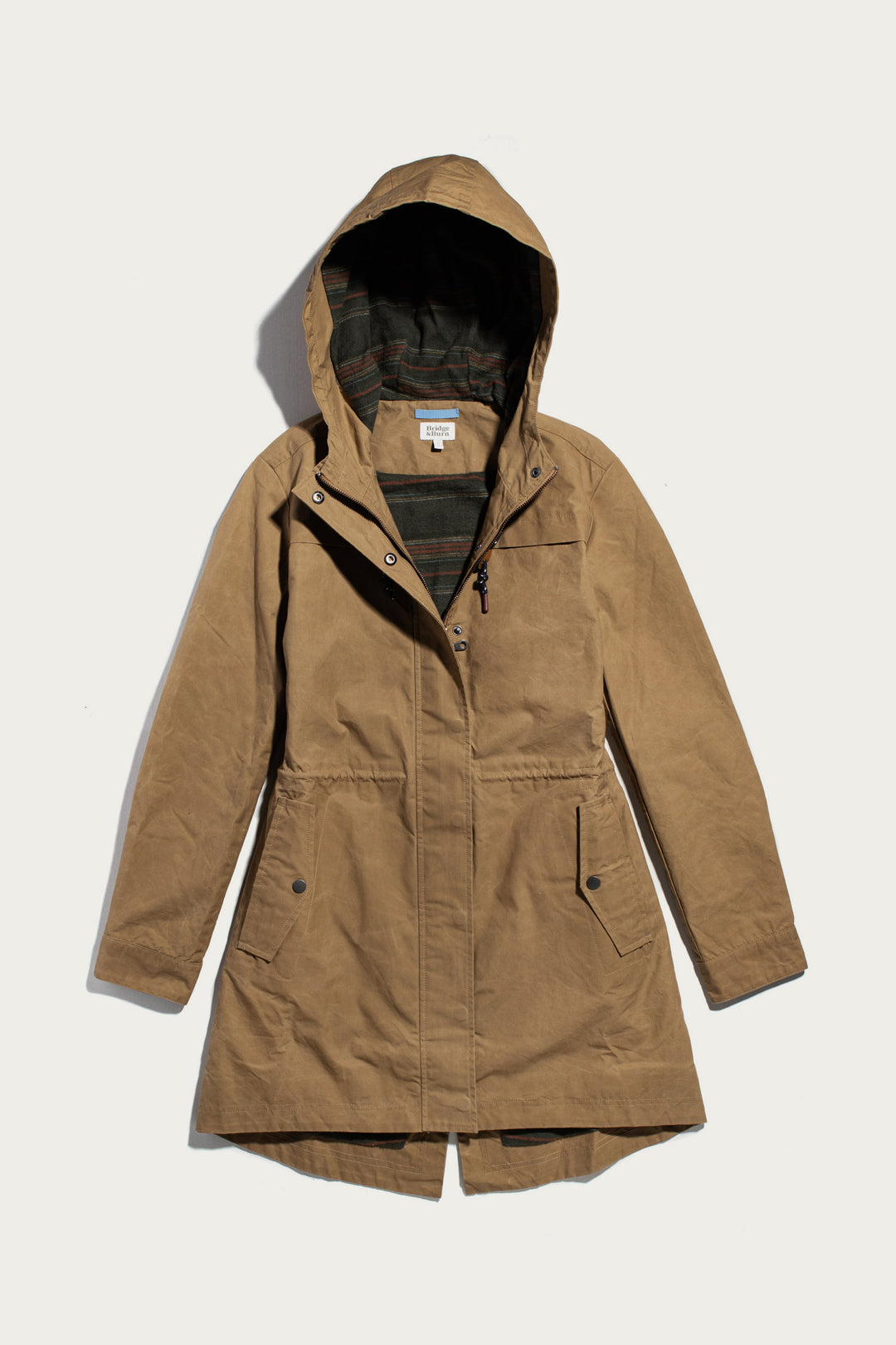 Briar Jacket / Dark Khaki Waxed Canvas hooded parka with a front zipper, snap buttons, and a dark striped lining.