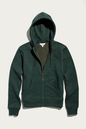 Bridge & Burn’s Mason Hoodie in Juniper is a dark green, zip-up sustainable hoodie featuring a hood, front pockets, and long sleeves, crafted from recycled French terry sweatshirt material and displayed flat on a white background.