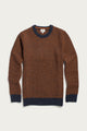 The Brighton Sweater in Autumn Tide by Bridge & Burn, a brown waffle knit sweater with a textured pattern, features navy blue ribbed cuffs, collar, and hem. It is shown laid flat on a white background.