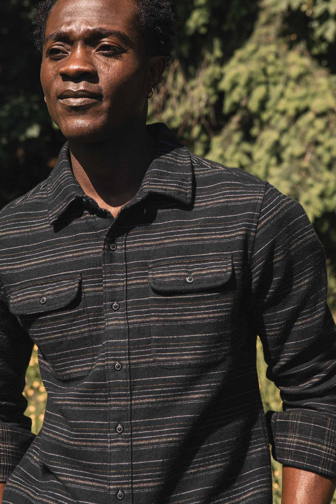Bridge & Burn Cole Slim Shirt in Raven Stripe, featuring a slim-fit, long-sleeve brushed cotton design with a dark gray and copper-colored stripe pattern and two button-flap chest pockets.