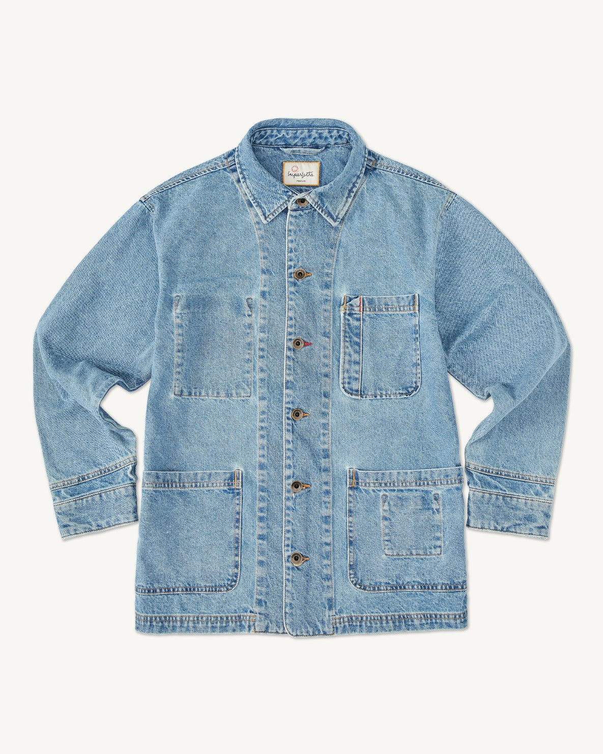 Light-wash Imperfects Cunningham Coat / Primo Denim chore coat featuring a button front, two chest pockets, and two lower patch pockets.