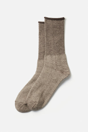 A pair of RoToTo City Socks in grey and dark brown by RoToTo, featuring a darker trim at the top, displayed on a plain white background.