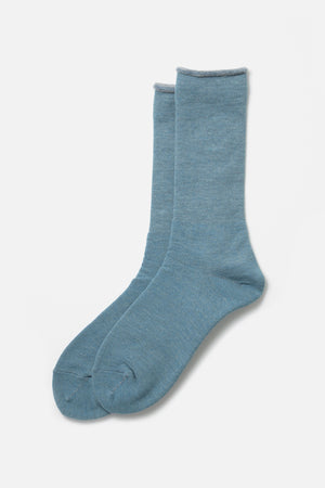 A pair of RoToTo City Socks in light blue-grey, featuring subtle gray trim at the top, from the brand RoToTo, shown laid flat on a white background.