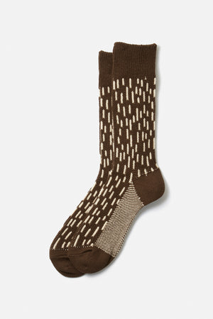 A pair of RoToTo Rain Drop Crew Socks in Dark Brown Ivory, featuring a raindrop camo pattern with solid brown toes, heels, and cuffs. Made in Japan by RoToTo for superior quality and comfort. Displayed on a white background.