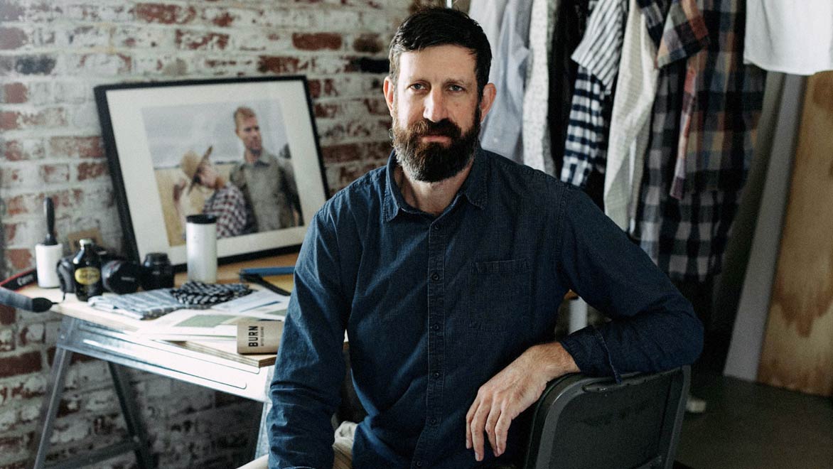 Bridge & Burn founder Erik Prowell at his desk