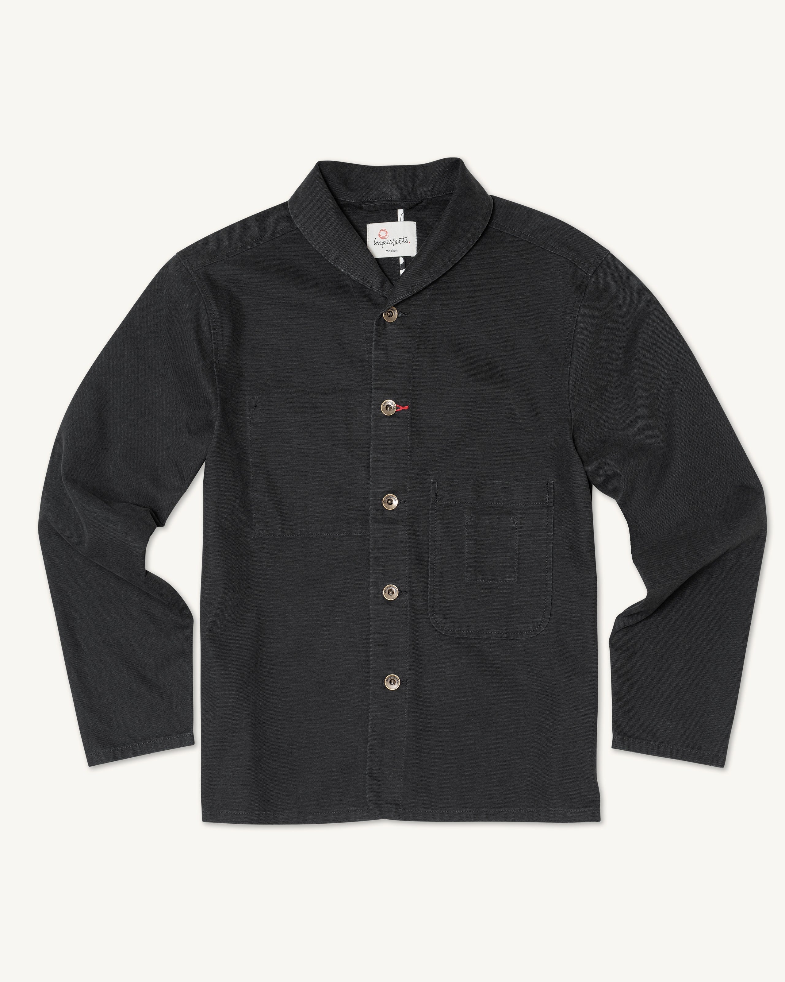 Black long-sleeve canvas Imperfects - Shepherds Shirt Craft Canvas / Obsidian with a collar and two front patch pockets.
