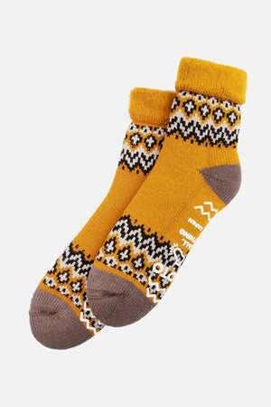 Stay cozy at home with RoToTo Comfy Room Socks / Nordic Yellow by RoToTo—yellow ankle socks with brown accents, a black and white geometric design, and non-slip soles for ultimate comfort and relaxation.