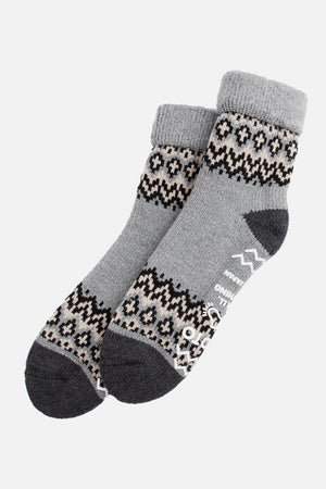 RoToTo Comfy Room Socks in Nordic Grey by RoToTo feature dark heels and toes, a black and beige geometric pattern around the ankle and foot, and offer a soft, cozy look. Made in Japan.