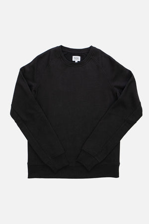 The Bridge & Burn Fremont Crew Sweatshirt in black is a sustainable, long-sleeve crewneck shown lying flat on a white background.