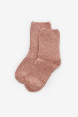 A pair of Le Bon Cloud Socks in Mulberry, soft terry knit, is laid flat on a white background with one sock slightly overlapping the other.