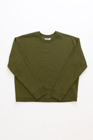 The Hawthorne Boxy Crew Sweatshirt in olive by Bridge & Burn is laid flat on a white background.